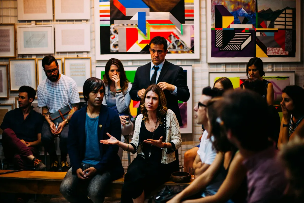 People mingling and talking at a networking event