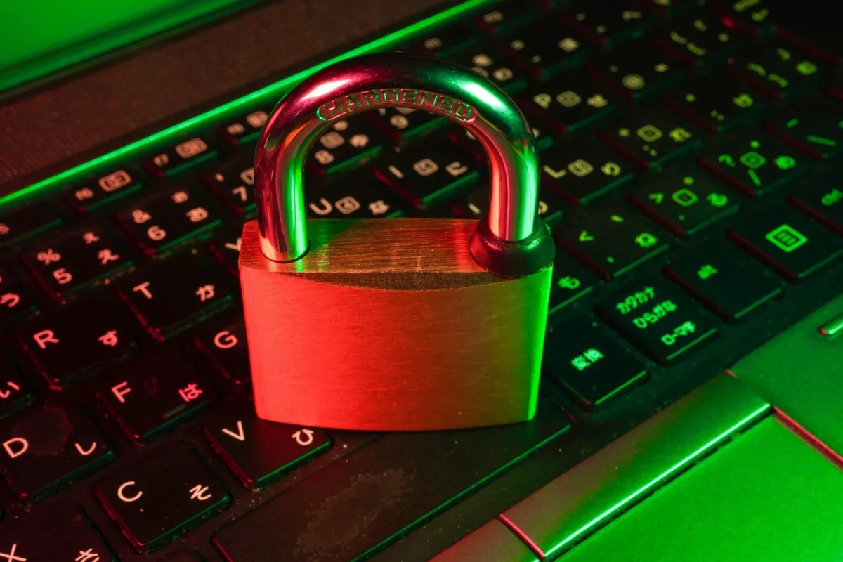 A red padlock on a keyboard, the security focus of smart contract auditor jobs
