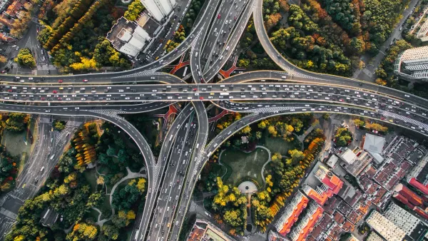 Aerial view of a highway interchange splitting into many directions