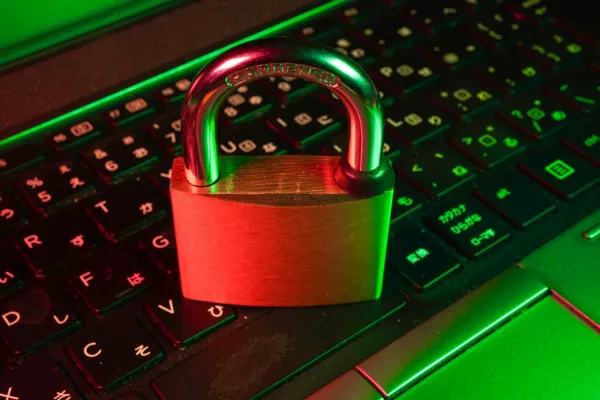 A red padlock on a keyboard, the security focus of smart contract auditor jobs