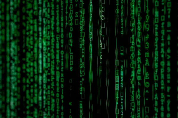 Green streams of matrix-style encrypted code on a black screen